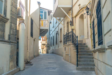 Empty street in old city Icheri Sheher of Baku, Azerbaijan. Architecture of Old city Baku. Inner City buildings.のeditorial素材
