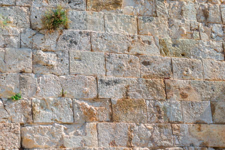 Texture of a marble stone wall. Old castle stone wall texture backgroundの写真素材