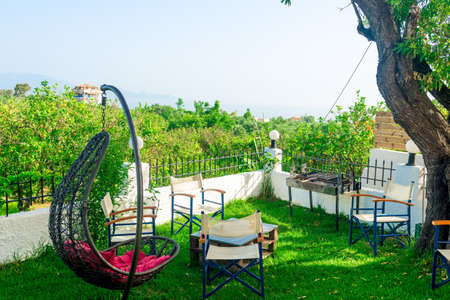 Patio furniture in garden, relaxation place at gardenの写真素材