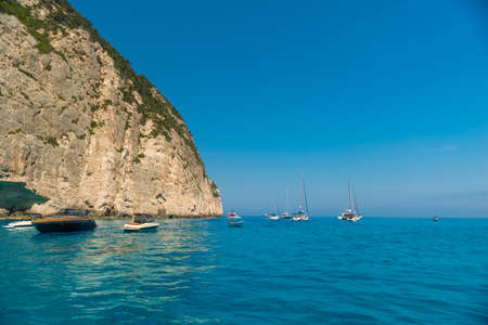rocky coast of greek island and sea view, landscape greece view from boatの写真素材
