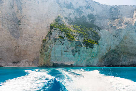 rocky coast of greek island and sea view, landscape greece view from boatの写真素材