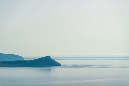 rocky coast of greek island and sea view, landscape greece view from boatの写真素材