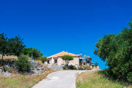 Idyllic Greek house in summer dayの写真素材