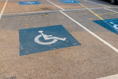 Road markings for the disabled. Disabled parking drawing on the pavementの写真素材