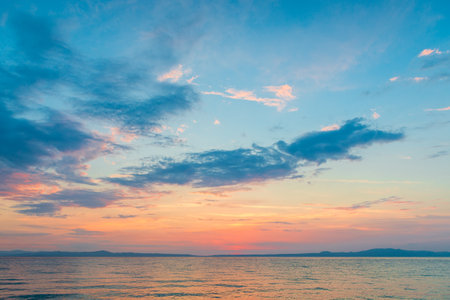 blue sky with clouds and sea, sunsetの写真素材