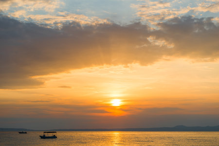 Evening sky with dramatic clouds over the sea. Dramatic sunset over the sea.の写真素材