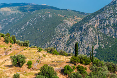 Mountain landscape. View of a green mountains on a sunny, spring day (Peloponnese, Greece)の写真素材