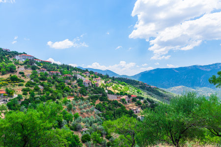 Mountain landscape. View of a green mountains on a sunny, spring day (Peloponnese, Greece)の写真素材
