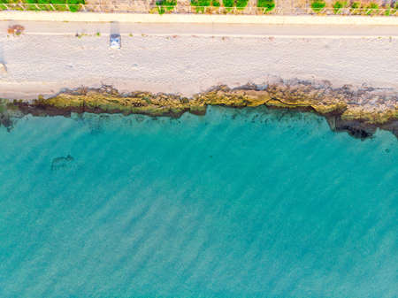 top view of turquoise sea and sandy beach
