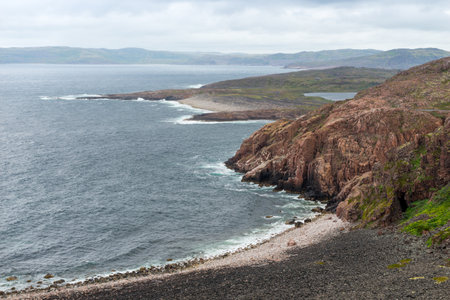 Summer tundra. Rocky coastline of the Barents Sea near Teriberka. Scenery of Russian North. Kola Peninsula, Murmansk Oblast, Russiaの写真素材