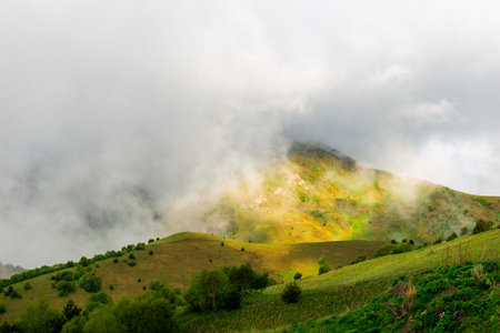 Picturesque mountains in the beautiful clouds of the North Caucasus. Russia