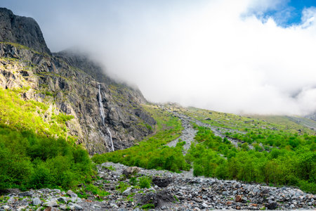Midagradinskaya mountain valley is surrounded by a giant barrier of vertical rocks. Stone massifs...