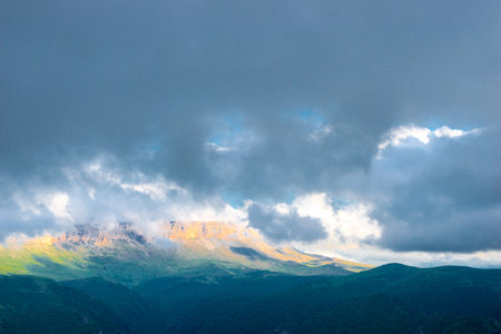 Dramatic landscape with black hurricane clouds over the Kanjol plateau in a mountainous area in bad weatherの写真素材