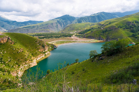 Picturesque view of the mountain lake Gizhgit with azure water. Caucasusの写真素材
