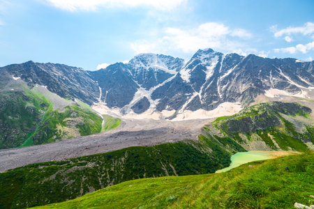 Picturesque mountain landscape with a view of the glacier "seven" and a mountain lake. Caucasus Mountainsの写真素材