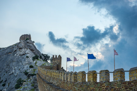 Dramatic landscape with the fortress wall of the Genoese fortress in the city of Sudak. Crimean Peninsula. Russiaの写真素材
