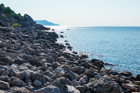 Dramatic seascape of Cape Plosky with large boulders. Crimean Peninsula. Russiaの写真素材