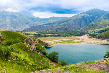 Picturesque view of the mountain lake Gizhgit with azure water. Caucasusの写真素材
