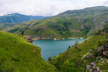 Picturesque view of the mountain lake Gizhgit in the shape of a heart with azure water. Caucasusの写真素材