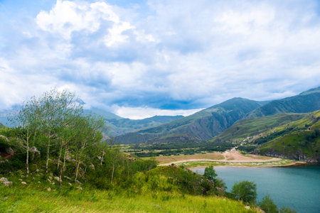 Picturesque view of the mountain lake Gizhgit with azure water. Caucasusの写真素材