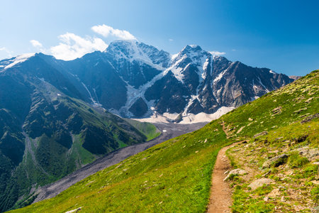 Picturesque view of the glacier seven with a tourist trail in sunny weatherの写真素材