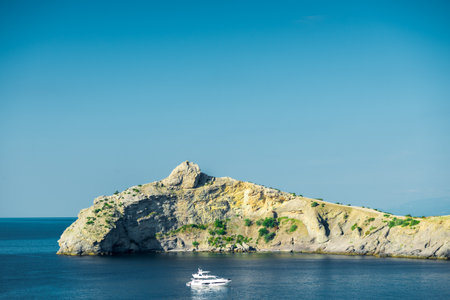 Picturesque seascape with beautiful view of Cape Kapchik and the Black Sea. Crimean Peninsula. Russiaの写真素材