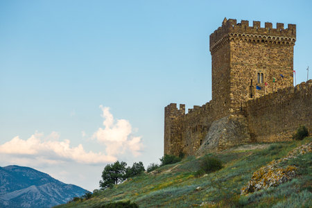 Beautiful view of the fortress wall with towers of the Genoese fortress in the city of Sudak. Crimean Peninsula. Russiaの写真素材