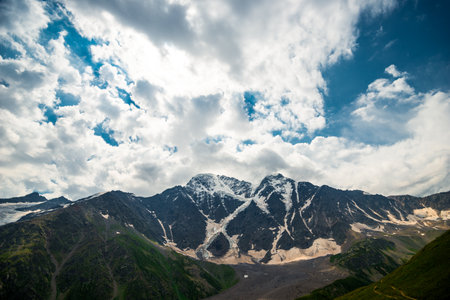 Beautiful dramatic view of the rocky glacier Semerka. North Caucasus