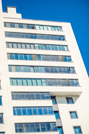 View of a modern residential building in clear sunny weatherの写真素材