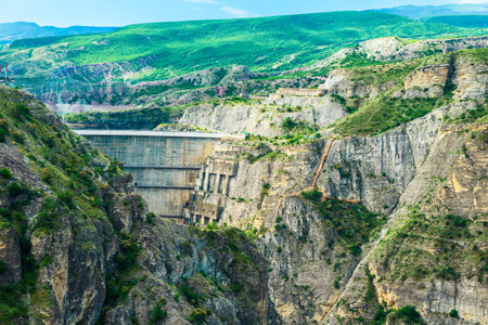 Stunning view of the Chigriyskaya hydroelectric power station on the mountain river Sulak in the mountains of the North Caucasus of Dagestan. Russiaの写真素材