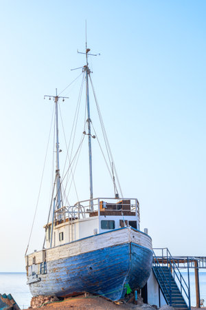 An old abandoned ship stands on the beach of a Red Sea resort in Egyptの写真素材