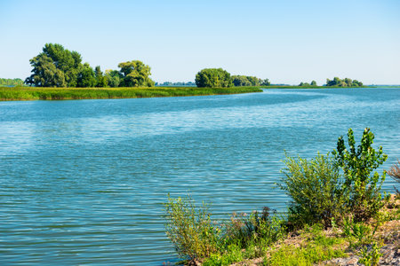 Picturesque landscape of the Volga River flood and green islands on it.の写真素材