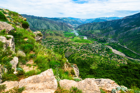 Stunning mountain landscape of green mountain river valley with rock formations in foreground. Dagestan Caucasusの写真素材