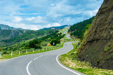 Picturesque mountain landscape with winding asphalt road. Caucasusの写真素材