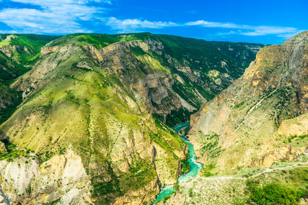 Panoramic landscape of a deep picturesque canyon of the Caucasian mountains of Dagestan and the azure mountain river Sulak. Russiaの写真素材
