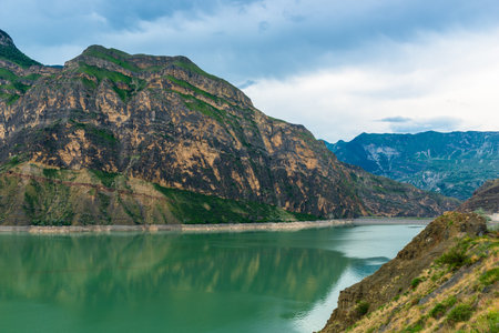 Picturesque landscape with mountain lake and layered beautiful mountains of the North Caucasus Dagestan Russiaの写真素材