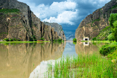 Dramatic landscape of a picturesque cliff gorge on a mountain river in pre-storm weather on the Dagestan highlands. North Caucasus. Russiaの写真素材