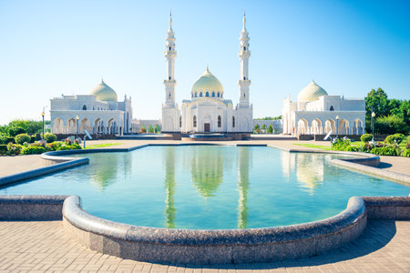 Beautiful view of white mosque with reflection in water. Russiaの写真素材
