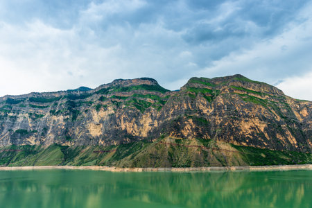 Picturesque landscape with mountain lake and layered beautiful mountains of the North Caucasus Dagestan Russiaの写真素材