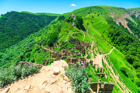 View of the ruins of an abandoned mountain village in the mountains of the North Caucasus
