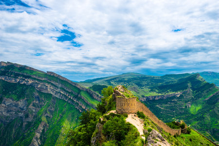 Picturesque mountain landscape with a photofacility tower of the Russian fortress in Gunib....
