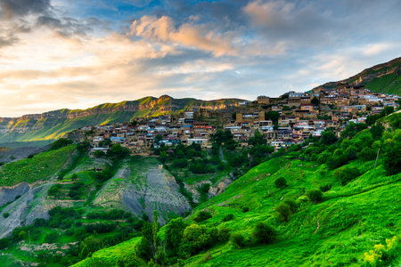 Picturesque view of the mountain village Chokh in the rays of the setting sun. Caucasusの写真素材