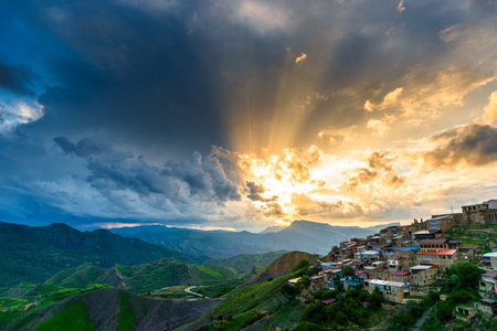 Picturesque sunset sky over the mountain village of Chokh. Caucasusの写真素材