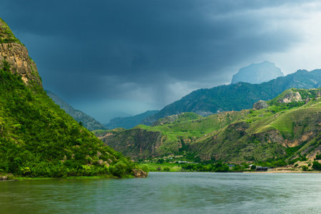 Dramatic mountain landscape of a mountain lake in stormy weather. North Caucasusの写真素材