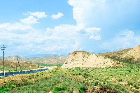 Picturesque landscape on a highway in the semi-desert of the North Caucasus mountainsの写真素材