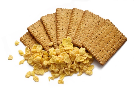 tasty crispy biscuits and cornflakes isolated on white background, healthy food