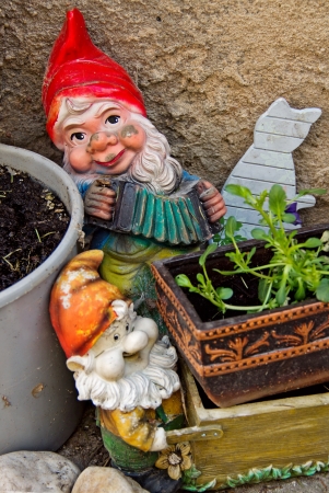 garden Gnomes on wall backgroundの写真素材