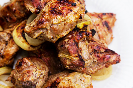 Grilled pork kebab on plate. Hot Meat Dishes.の写真素材