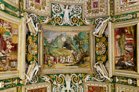 Rome, Italy - April 22, 2013: Interior of gallery fragment of ceiling with iconographic scenes of the Vatican Museum, Vatican City, Rome, Italyのeditorial素材