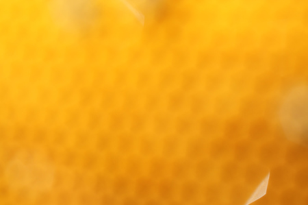 Bokeh background from bees honeycomb. defocused textureの写真素材